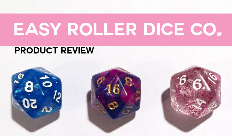 Easy Roller Dice Co. Product Review. Below text are three d20 dice, blue, purple swirl, and sparkly pink