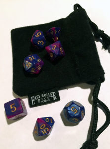 Purple Dawn dice, over white surface with black dice bag. There are 7 dice of various side counts