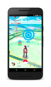 Screengrab of Pokemon Go, player with a blue target before them, on a google map type grid