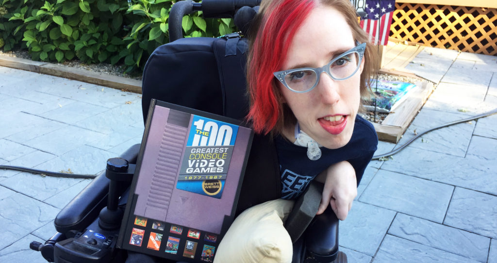Erin holding book, cover showing