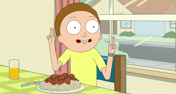Morty GIF making a silly face and pasta in front of him on a table