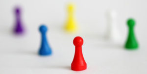 6 game pawns in different basic colors