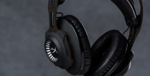 Black headphones on a dark blue background